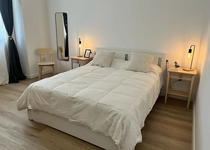 Suites Larios Rooms