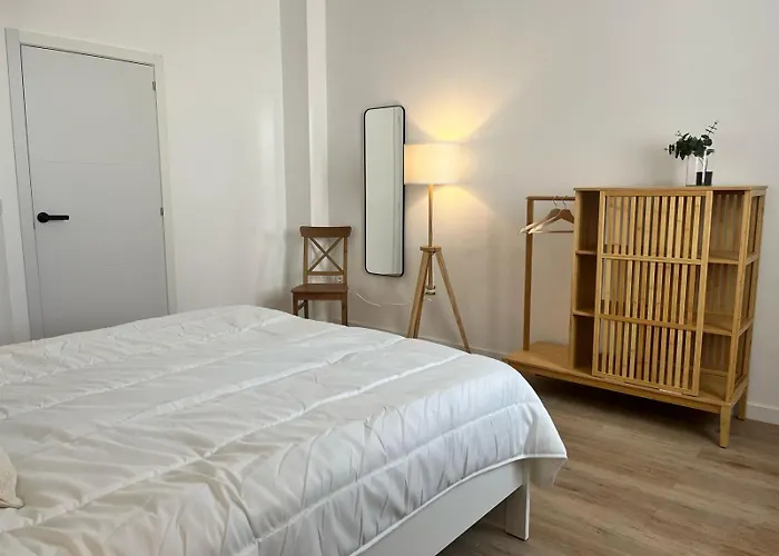 Suites Larios Rooms